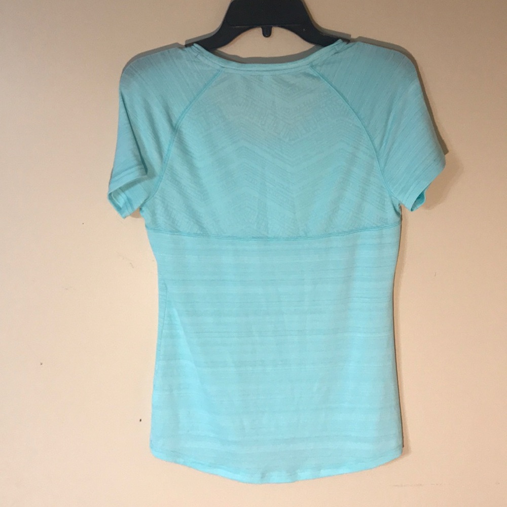 Donated 
small MTA workout top color: light teal - Picture 2 of 3